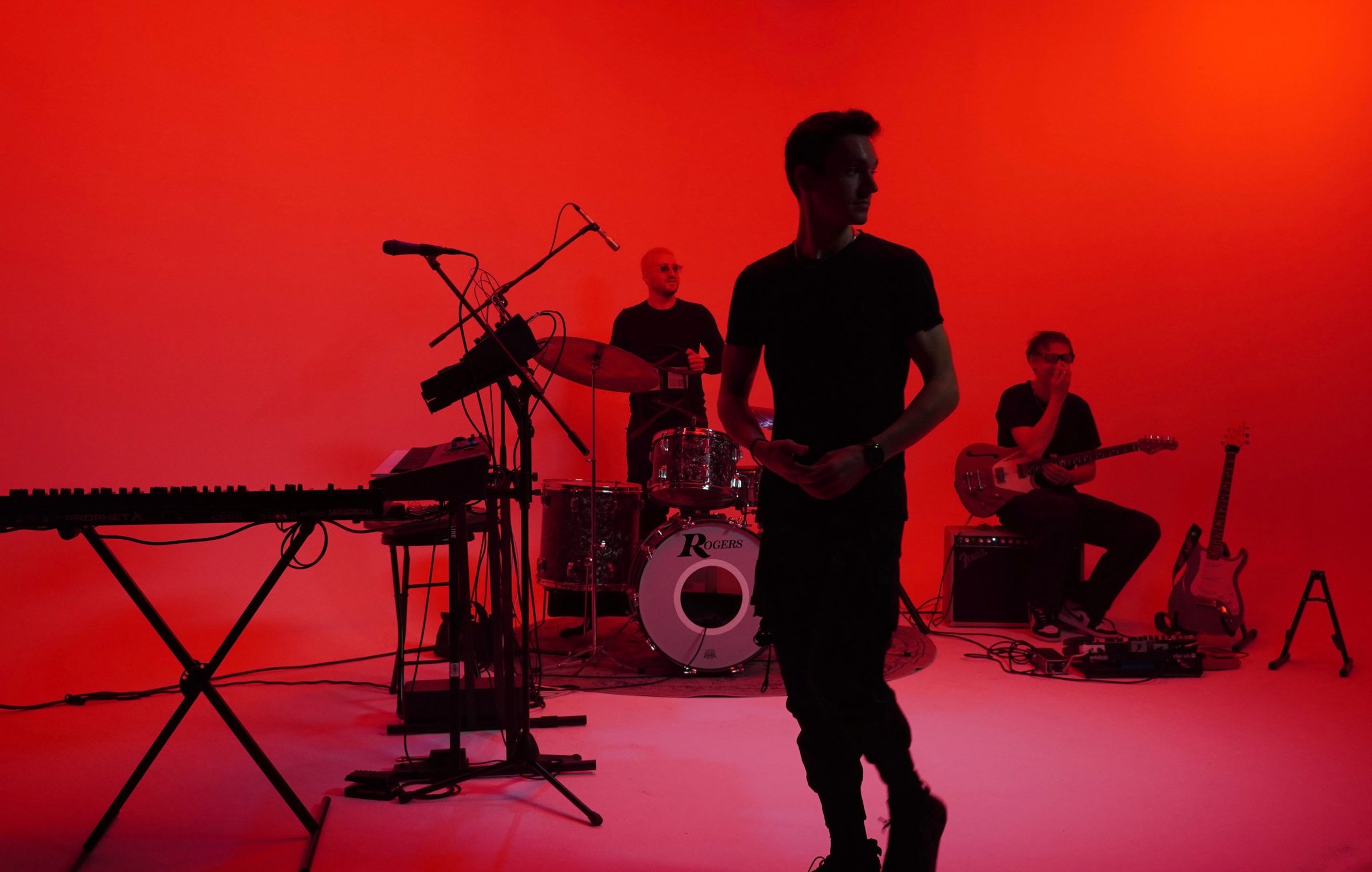 FM Experiment on stage with keys, drums and guitar